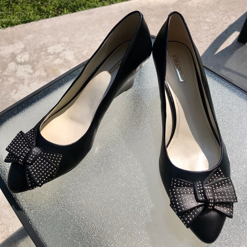 Brand new BCBG Asya black leather wedge pumps